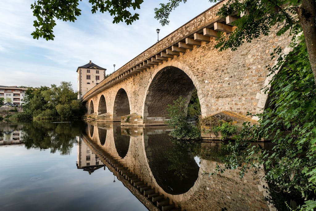 A picturesque view of the stone bridge and reflection in Limburg an der Lahn, Germany.